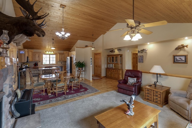 7621 Winter Trl, Breezy Point, MN 56472 - living room featuring wooden ceiling, a ceiling fan, light colored carpet, high vaulted ceiling, and a chandelier