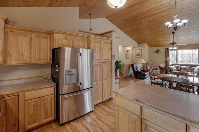 7621 Winter Trl, Breezy Point, MN 56472 - kitchen with stainless steel fridge, wooden ceiling, open floor plan, light wood-style flooring, and light countertops