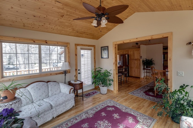 7621 Winter Trl, Breezy Point, MN 56472 - living area featuring lofted ceiling, wooden ceiling, ceiling fan, wood finished floors, and baseboards