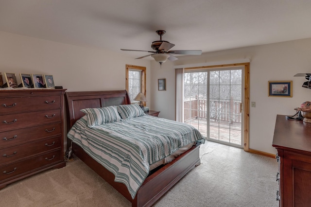 7621 Winter Trl, Breezy Point, MN 56472 - bedroom with light carpet, access to exterior, ceiling fan, and baseboards