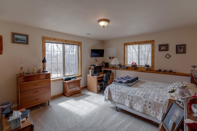 7621 Winter Trl, Breezy Point, MN 56472 - bedroom with light colored carpet, multiple windows, baseboards, and an office area