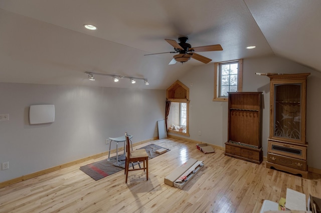 7621 Winter Trl, Breezy Point, MN 56472 - bonus room featuring a ceiling fan, wood finished floors, lofted ceiling, and baseboards
