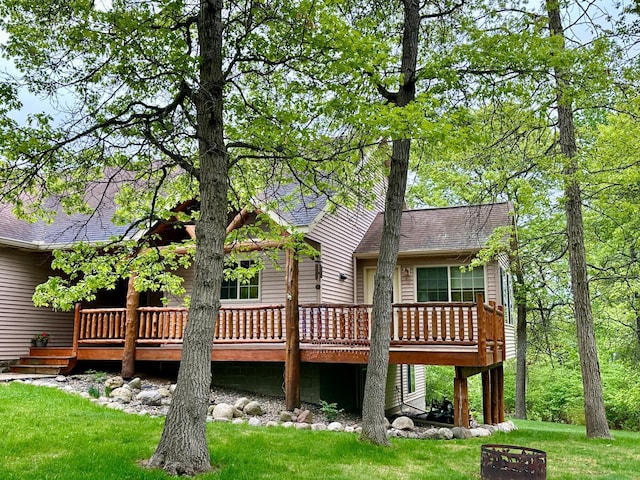7621 Winter Trl, Breezy Point, MN 56472 - rear view of house with a wooden deck, a yard, and roof with shingles