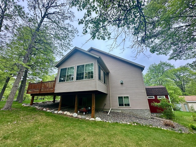 7621 Winter Trl, Breezy Point, MN 56472 - rear view of house with a lawn and a wooden deck