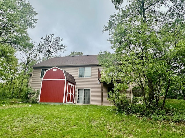 7621 Winter Trl, Breezy Point, MN 56472 - back of house with a lawn, an outbuilding, and a barn