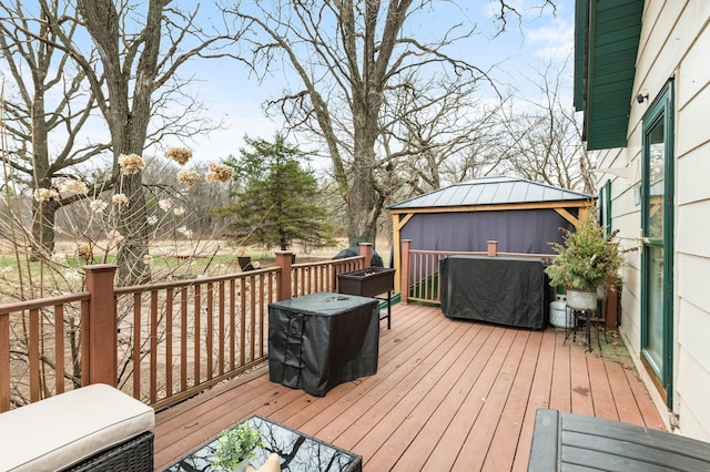 wooden terrace with a gazebo