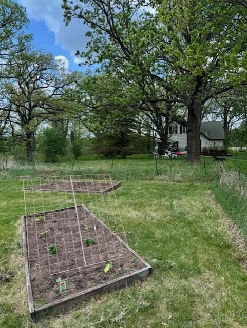 2908 River Rd, Saint Croix Falls, WI 54024 - view of green lawn with a garden