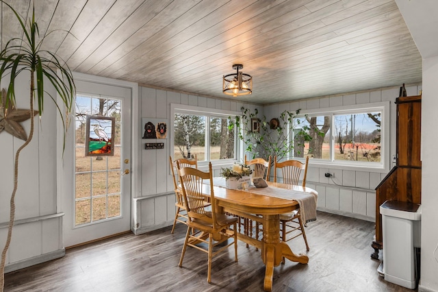 2908 River Rd, Saint Croix Falls, WI 54024 - dining area with wooden ceiling, light wood-style flooring, and a chandelier