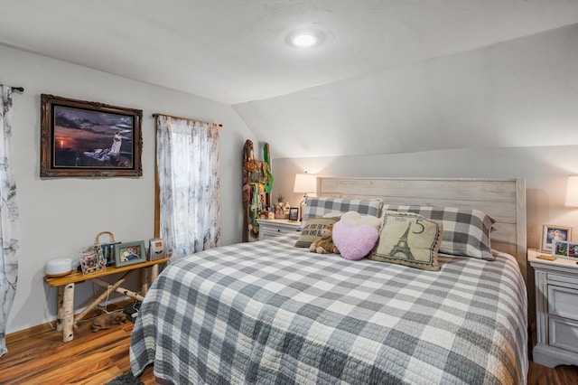 2908 River Rd, Saint Croix Falls, WI 54024 - bedroom with vaulted ceiling and wood finished floors