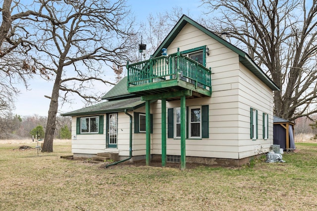 2908 River Rd, Saint Croix Falls, WI 54024 - view of front of home featuring a front yard and a deck