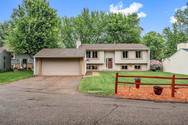 11560 Red Fox Dr, Maple Grove, MN 55369 - split foyer home with a front yard and a chimney
