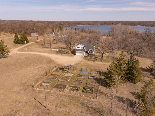 birds eye view of property featuring a water view