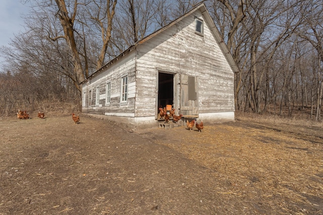 exterior space featuring an outbuilding