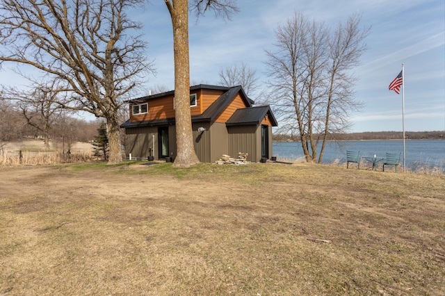 exterior space with a water view