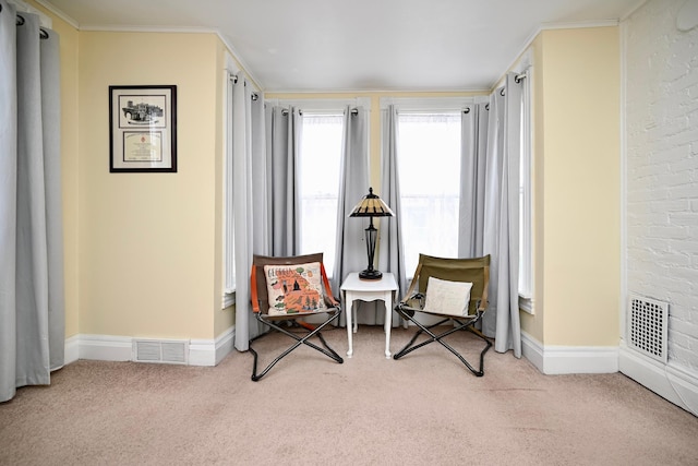 living area with baseboards, carpet flooring, and visible vents
