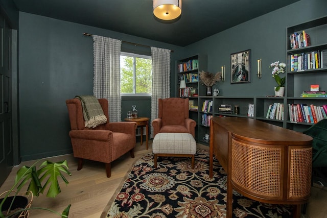 sitting room with wood finished floors