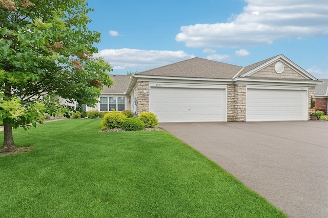 7931 Pinnacle Ave NE, Otsego, MN 55330 - ranch-style house with asphalt driveway, stone siding, a garage, and a front yard