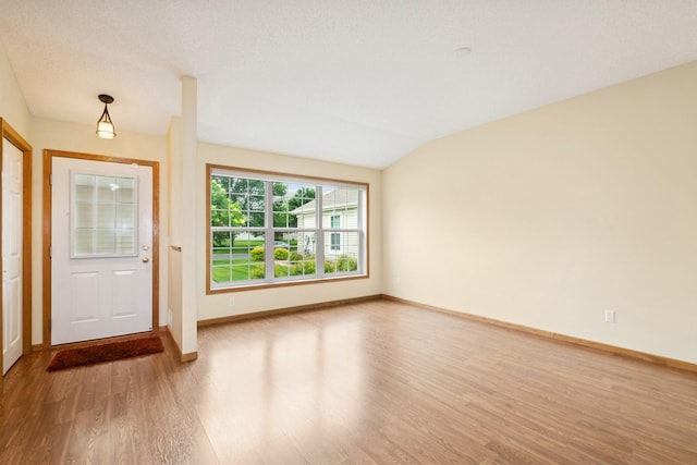 7931 Pinnacle Ave NE, Otsego, MN 55330 - entryway with wood finished floors and lofted ceiling