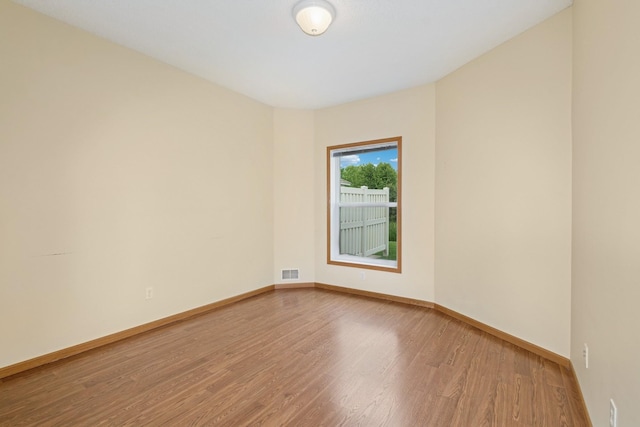 7931 Pinnacle Ave NE, Otsego, MN 55330 - empty room featuring wood finished floors and baseboards