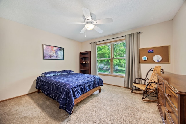 4545 Terraceview Ln N, Plymouth, MN 55446 - carpeted bedroom with baseboards, a ceiling fan, and a textured ceiling