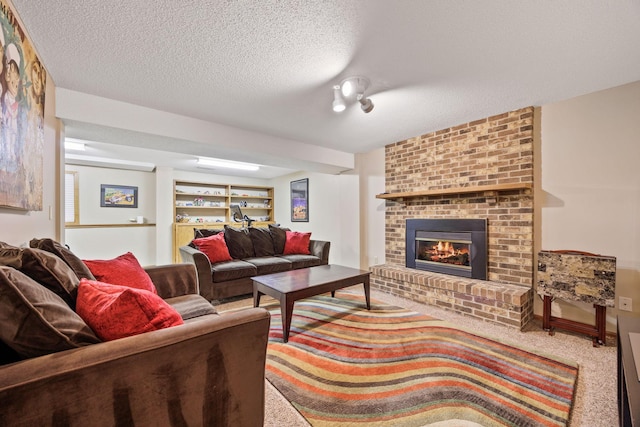 4545 Terraceview Ln N, Plymouth, MN 55446 - living room featuring a fireplace, carpet, and a textured ceiling