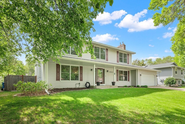 4545 Terraceview Ln N, Plymouth, MN 55446 - traditional-style house featuring an attached garage, a chimney, concrete driveway, and a porch