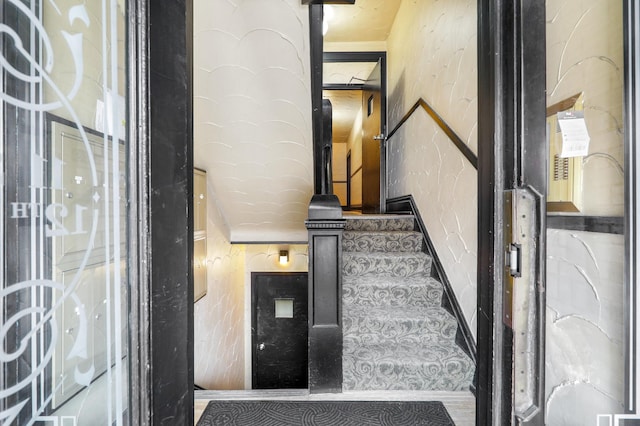 staircase with baseboards
