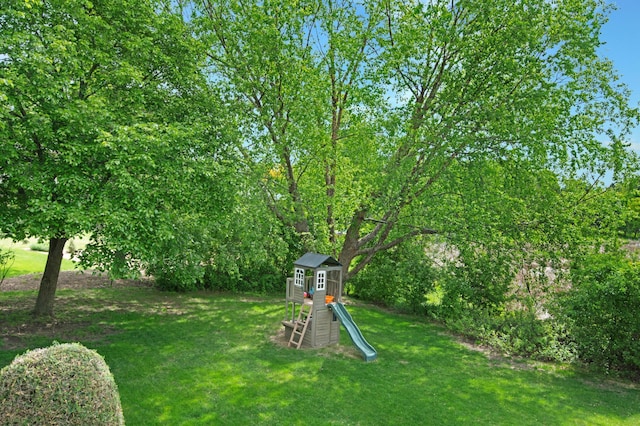 2806 Jasmine Ct, Saint Cloud, MN 56301 - view of green lawn featuring a playground