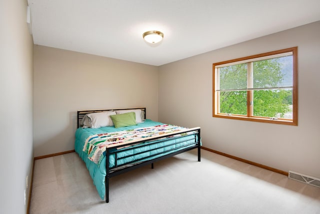 2806 Jasmine Ct, Saint Cloud, MN 56301 - carpeted bedroom featuring baseboards