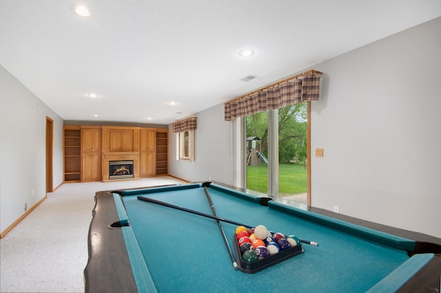 2806 Jasmine Ct, Saint Cloud, MN 56301 - recreation room featuring pool table, recessed lighting, a lit fireplace, baseboards, and carpet floors