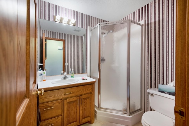 2806 Jasmine Ct, Saint Cloud, MN 56301 - full bath with wallpapered walls, a shower stall, toilet, and vanity