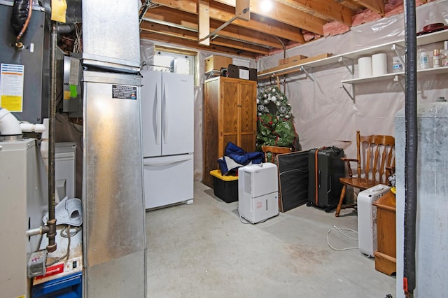 2806 Jasmine Ct, Saint Cloud, MN 56301 - unfinished basement featuring freestanding refrigerator