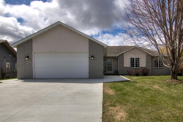 ranch-style house featuring brick siding, a garage, driveway, and a front yard