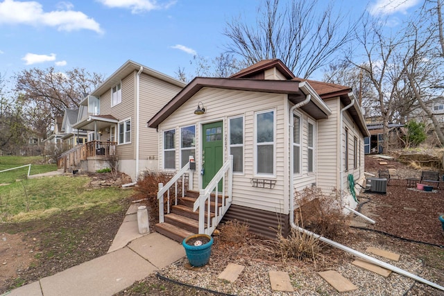 2943 Taylor St NE, Minneapolis, MN 55418 - view of front of house featuring entry steps and central AC unit