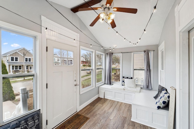 2943 Taylor St NE, Minneapolis, MN 55418 - unfurnished sunroom featuring beamed ceiling