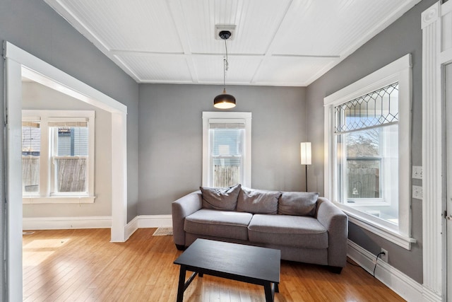 2943 Taylor St NE, Minneapolis, MN 55418 - living area with baseboards, light wood-type flooring, and a wealth of natural light