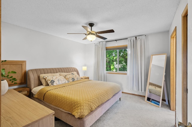 4032 Hollyhock Cir N, Brooklyn Park, MN 55443 - bedroom with light carpet, ceiling fan, and a textured ceiling