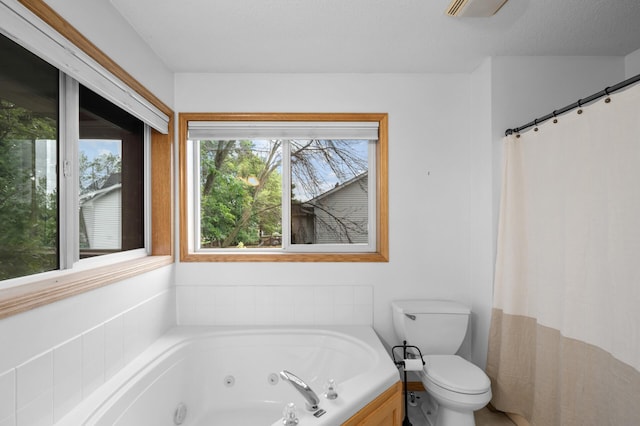 4032 Hollyhock Cir N, Brooklyn Park, MN 55443 - full bathroom featuring a jetted tub and toilet