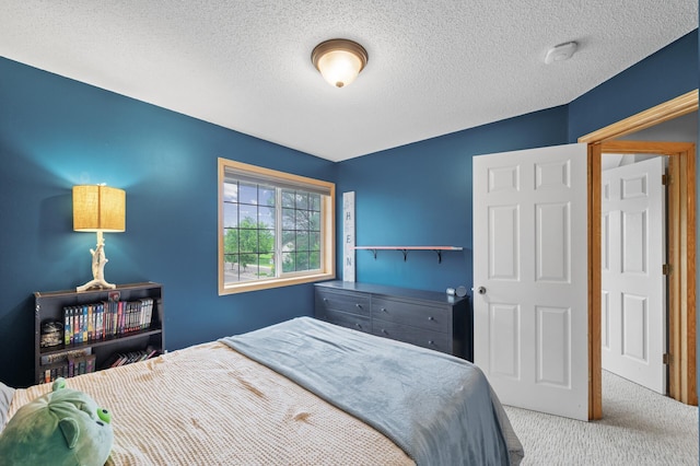 4032 Hollyhock Cir N, Brooklyn Park, MN 55443 - carpeted bedroom with a textured ceiling