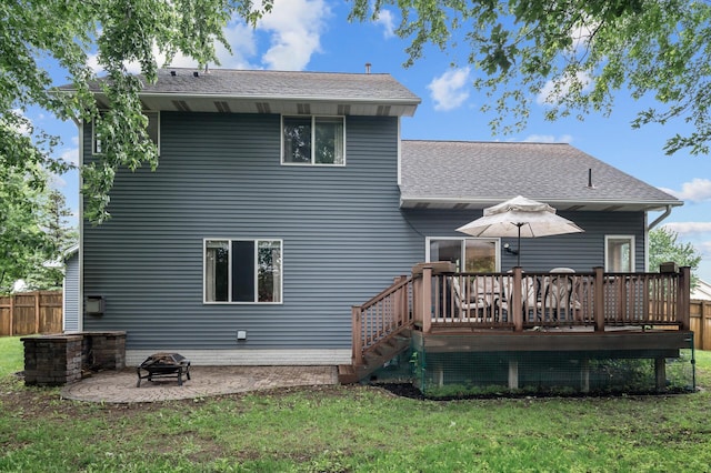 4032 Hollyhock Cir N, Brooklyn Park, MN 55443 - rear view of property with an outdoor fire pit, a deck, roof with shingles, and a patio area