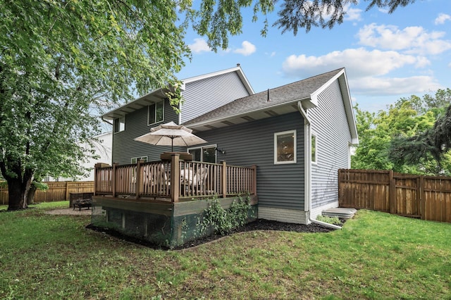 4032 Hollyhock Cir N, Brooklyn Park, MN 55443 - back of house with a wooden deck and a fenced backyard