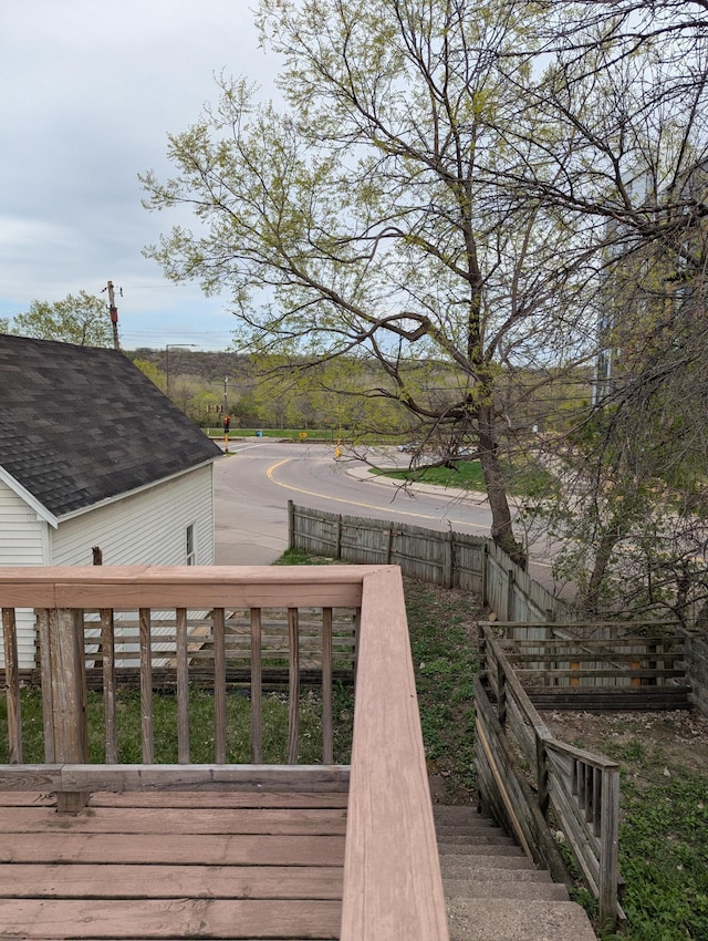 wooden deck featuring fence