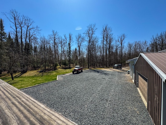 17783 Lookout Tower Rd NE, Hines, MN 56647 - view of dirt / gravel road with a forest view