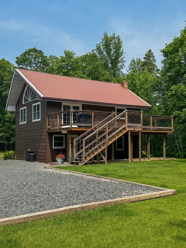 17783 Lookout Tower Rd NE, Hines, MN 56647 - back of house with a wooden deck, a metal roof, and stairway