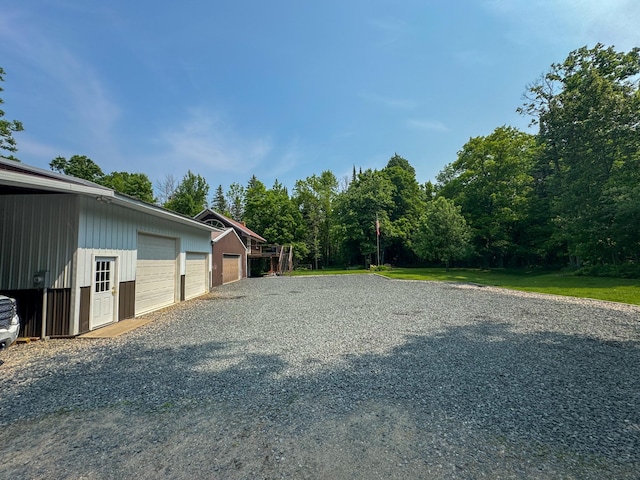 17783 Lookout Tower Rd NE, Hines, MN 56647 - view of yard with an outbuilding and a detached garage