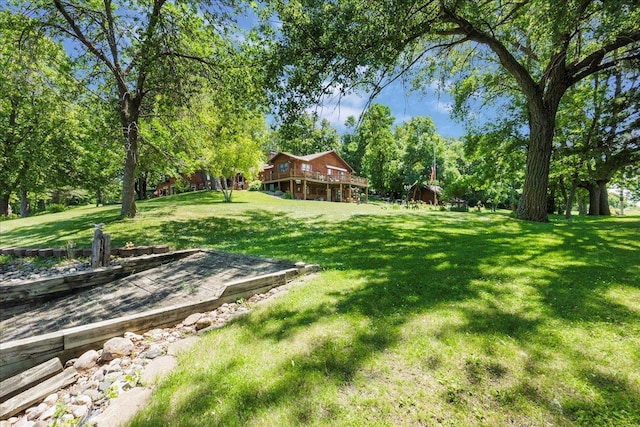 1122 Andrew Dr NE, Lake Andrew Twp, MN 56273 - view of grassy yard with a wooden deck