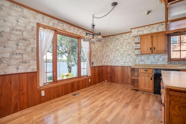 1122 Andrew Dr NE, Lake Andrew Twp, MN 56273 - kitchen featuring open shelves, a wainscoted wall, healthy amount of natural light, ornamental molding, and a chandelier