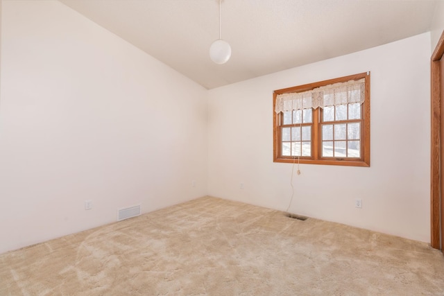 1122 Andrew Dr NE, Lake Andrew Twp, MN 56273 - unfurnished room with carpet flooring and vaulted ceiling