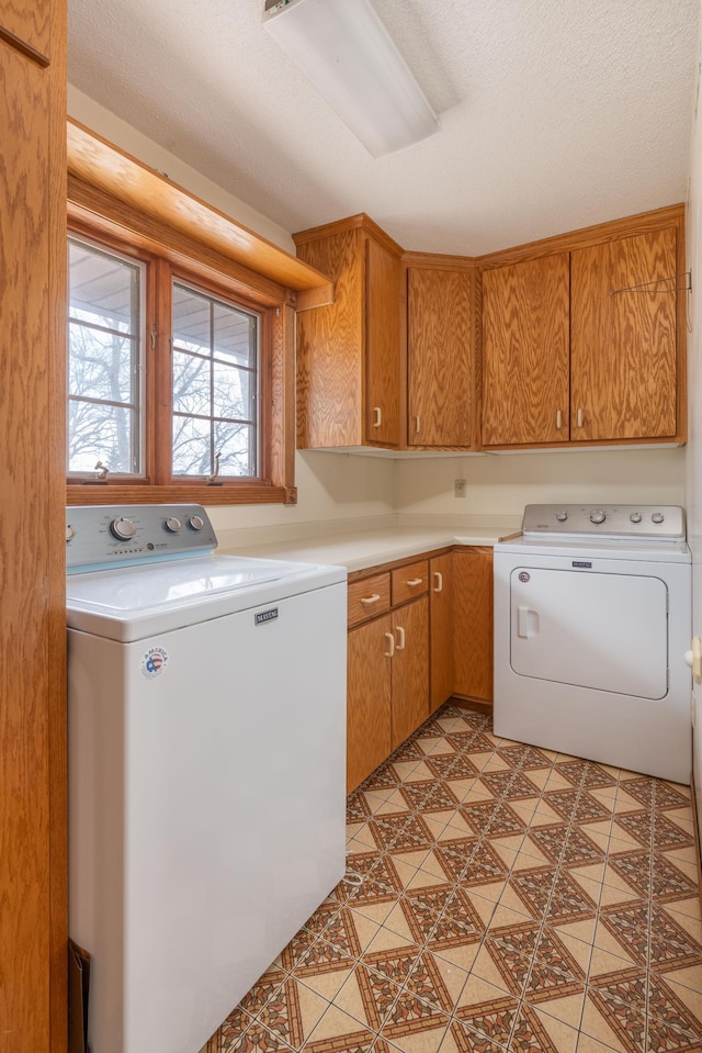 1122 Andrew Dr NE, Lake Andrew Twp, MN 56273 - washroom featuring cabinet space and washing machine and clothes dryer