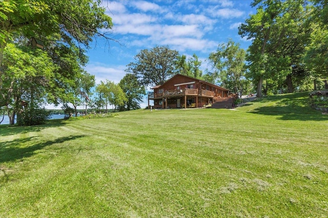 1122 Andrew Dr NE, Lake Andrew Twp, MN 56273 - view of green lawn with a deck and stairs